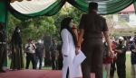 Bičevanje preljubnice u Acehu u Indoneziji